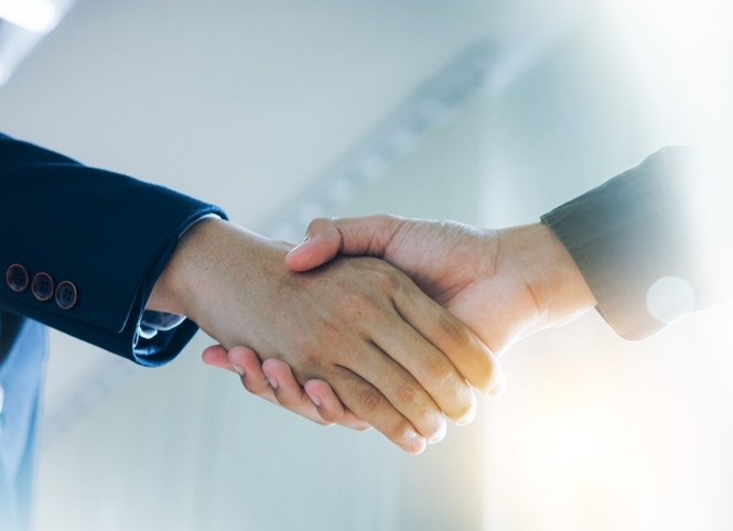 Financial planners collaborating at a desk
